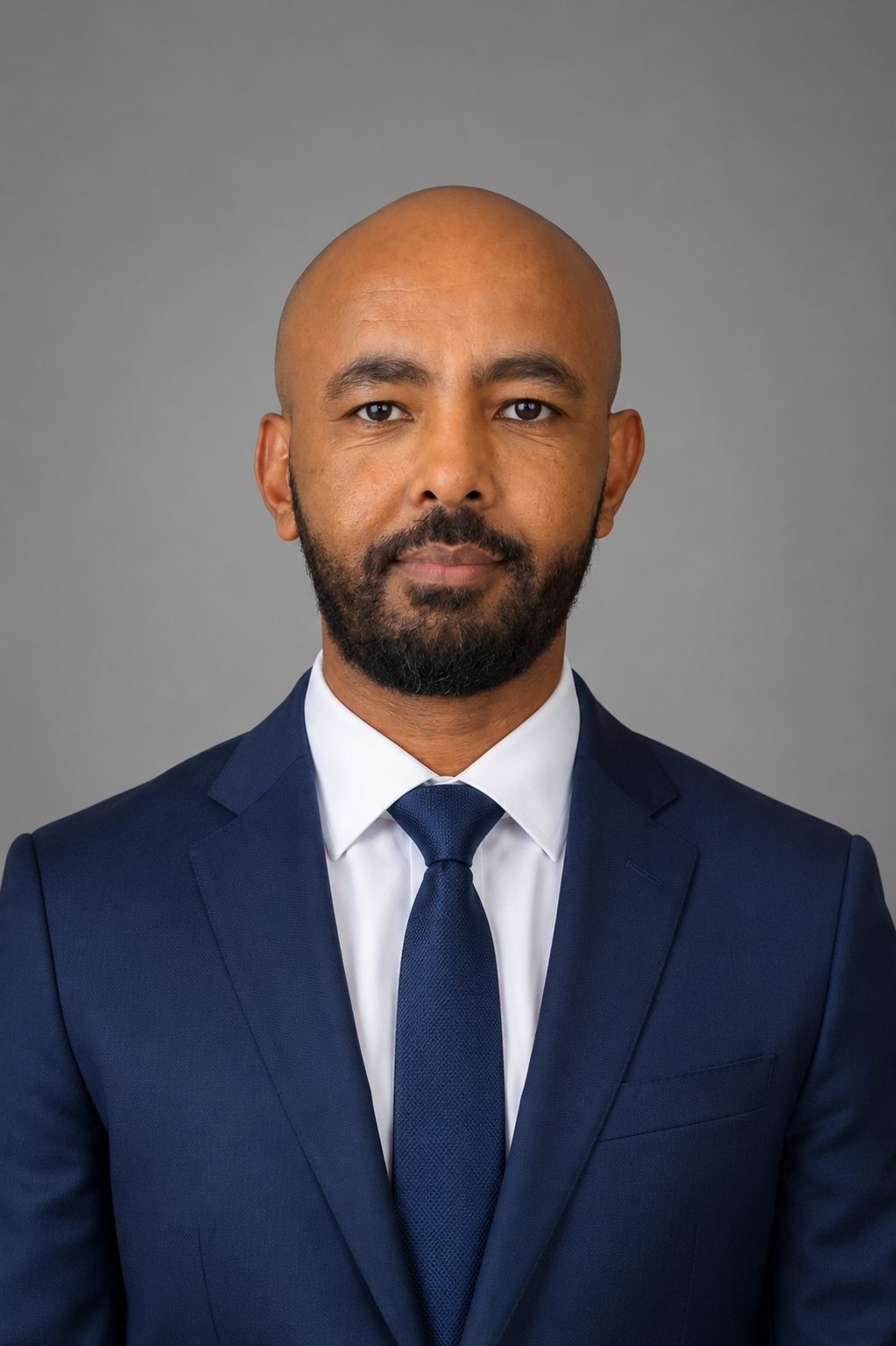 Gashaw Adugna, MD in a blue suit portrait